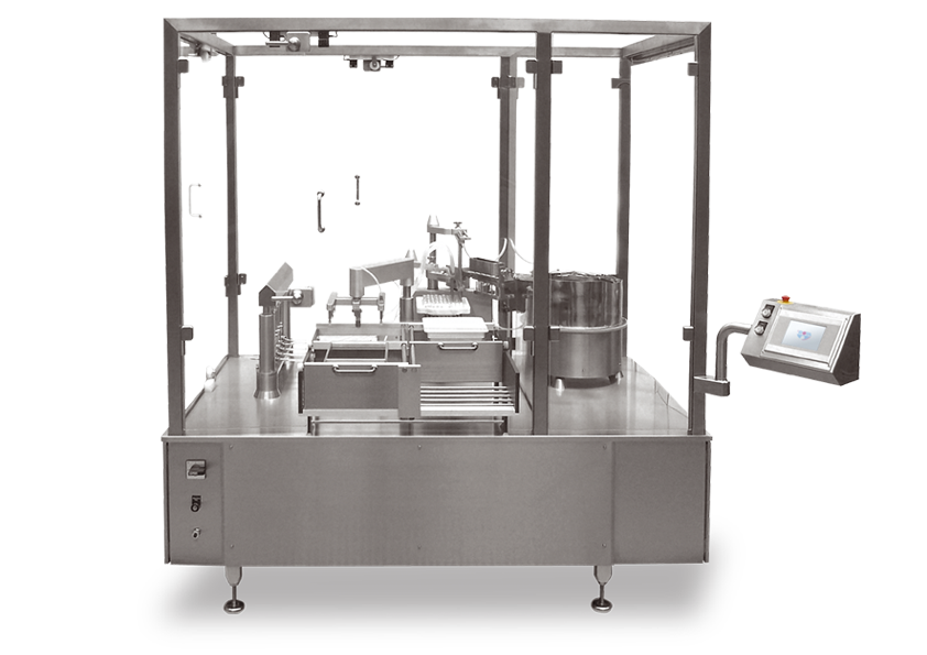 Filling and closing machine for parenterals
