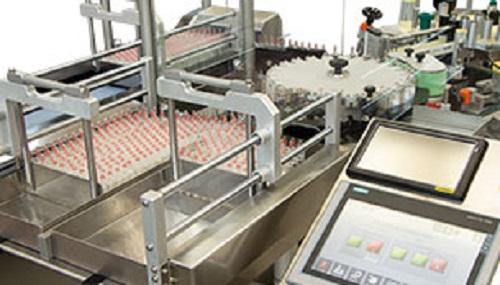 Pharmaceutical rotary labeling machine for vials