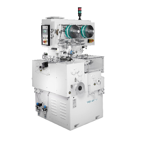 Tvarovací a balicí systém pro měkké karamely s komiksovým proužkem